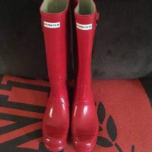 Shiny red hunter rain boots