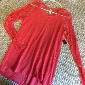 Peach long sleeve top.