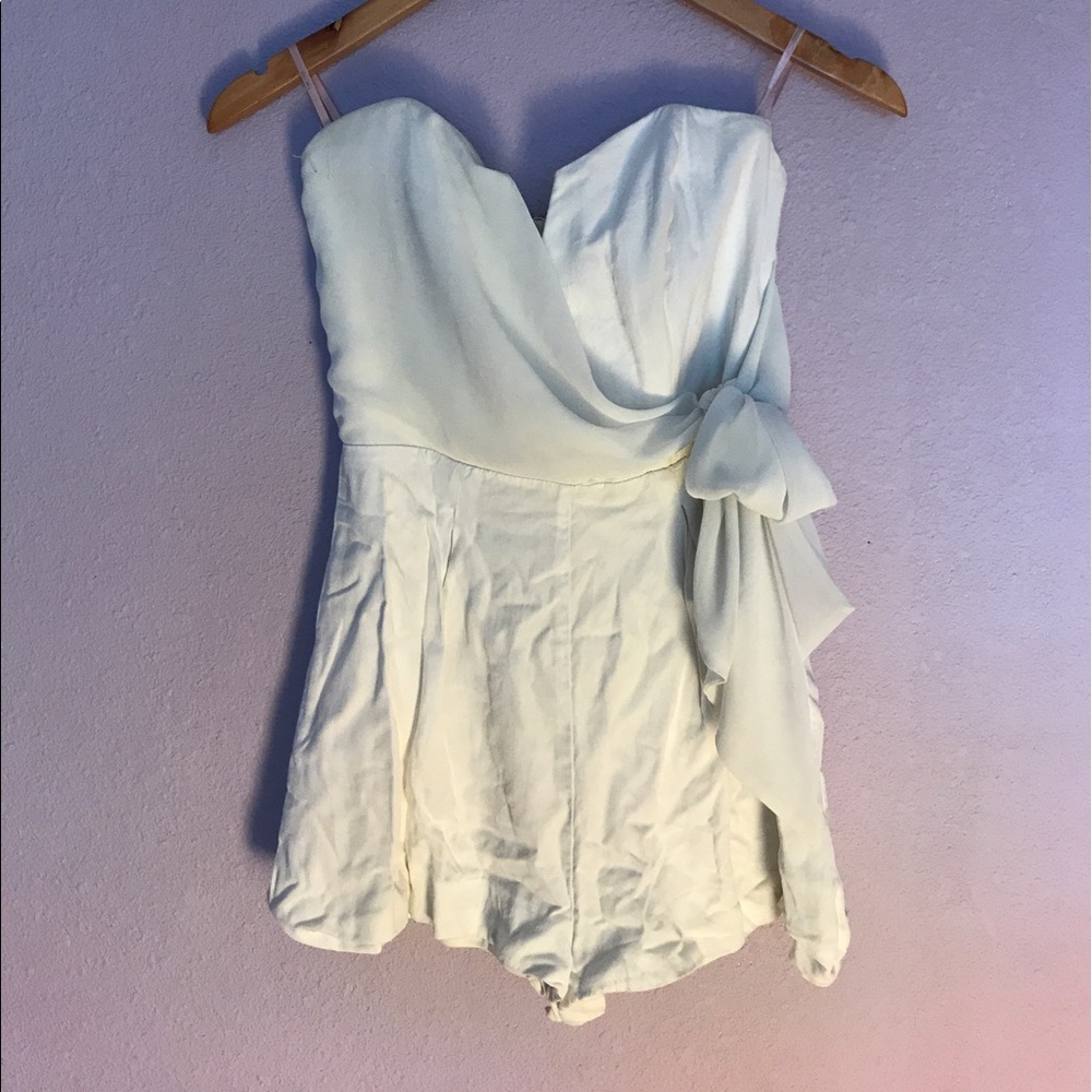 White romper with a bow