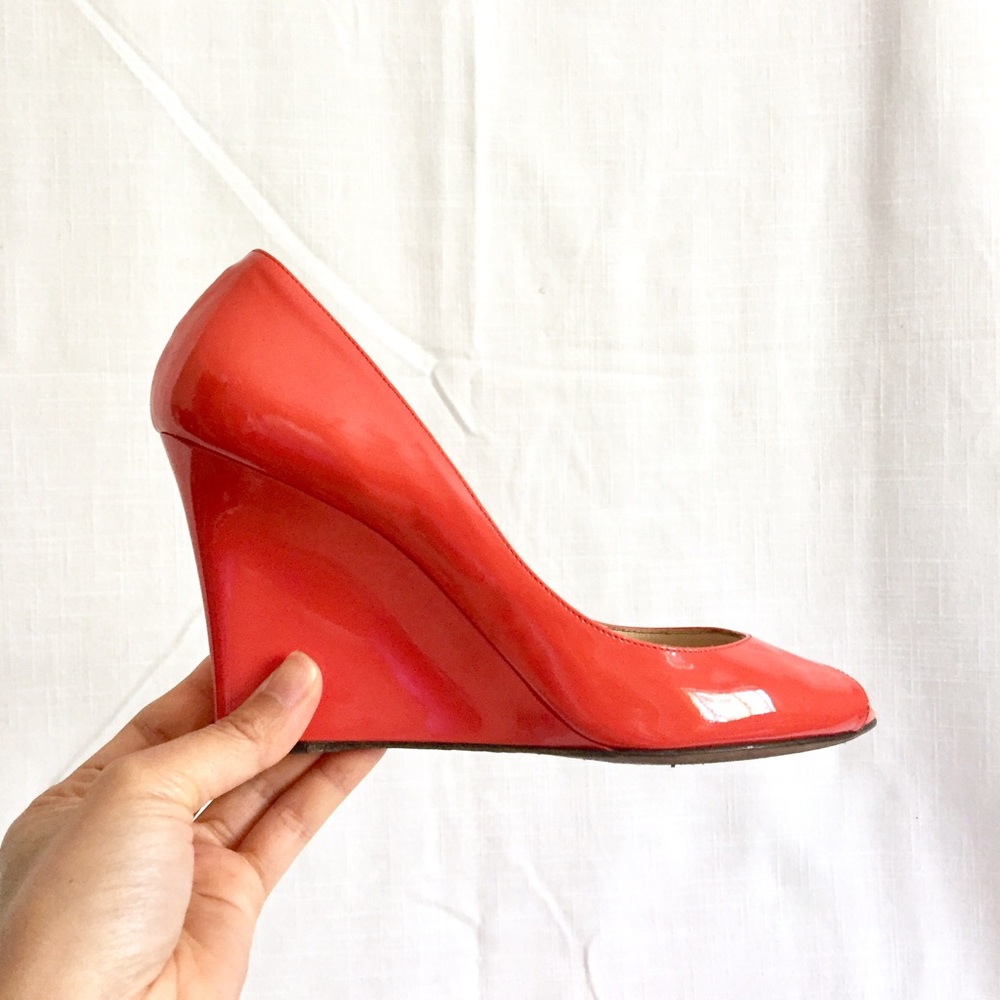 Jimmy Choo Baxen Patent leather wedge pumps orange