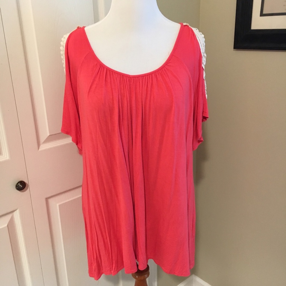 Flowy knit tunic with cold shoulder detailing