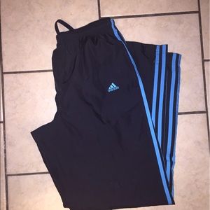 Turquoise and black windpants