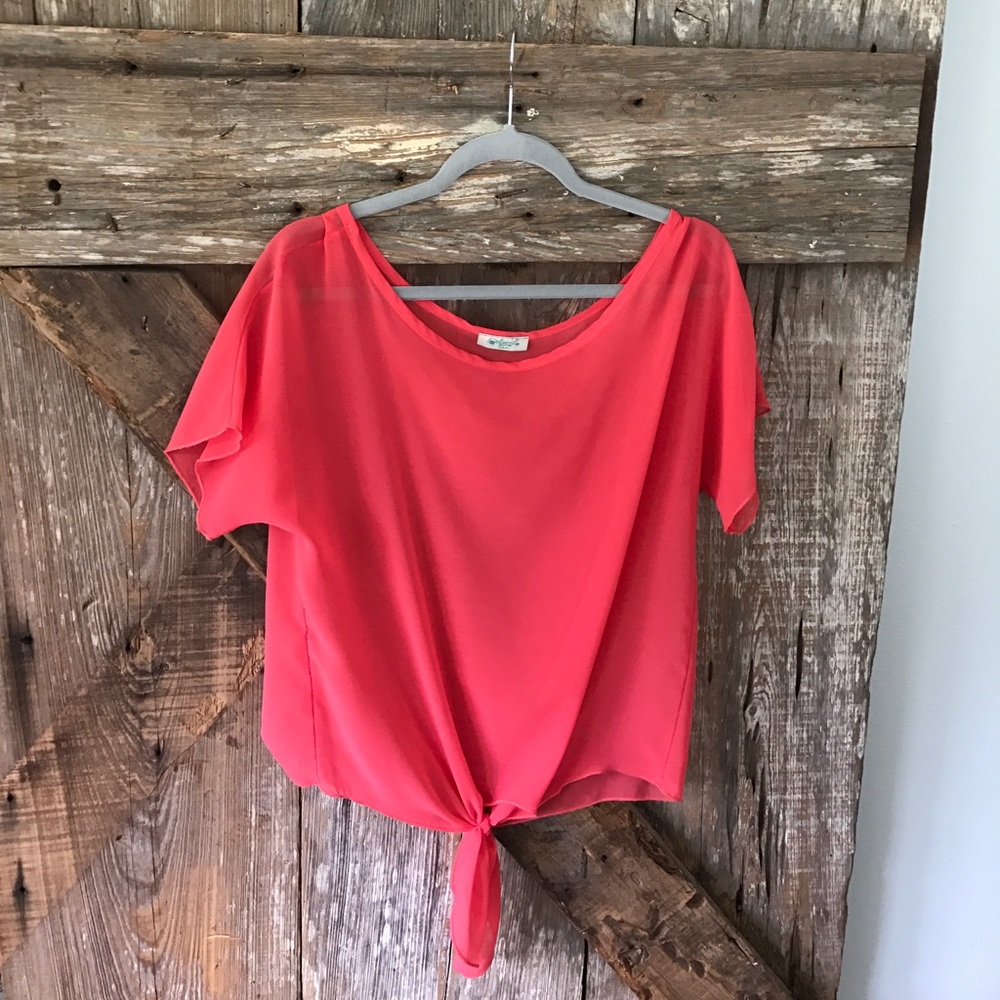 Sheer blouse fits like a Medium. Perfect condition