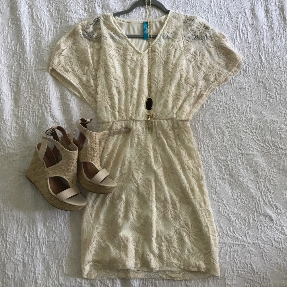 Cream colored short dress. Tag says medium.