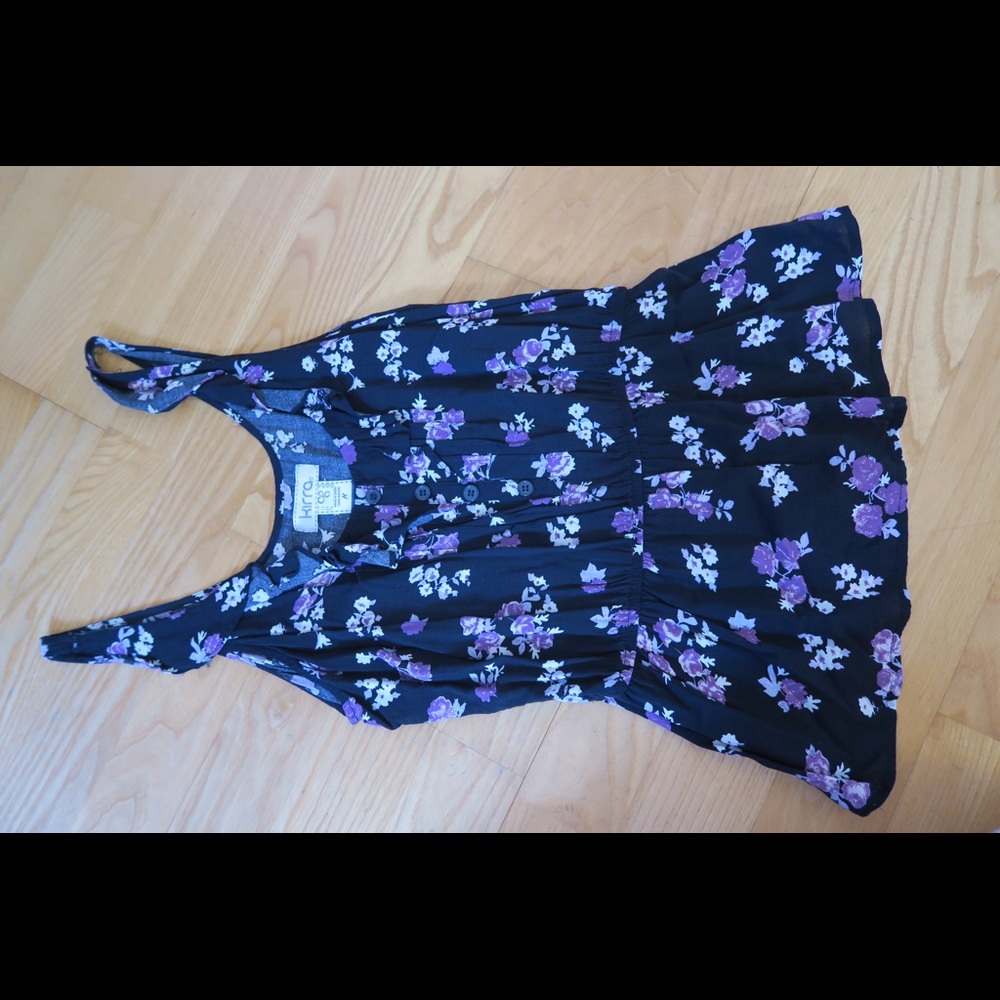 Black top with purple floral pattern