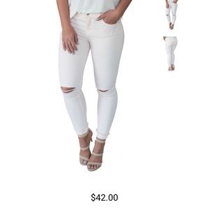 Light pink knee slit denim