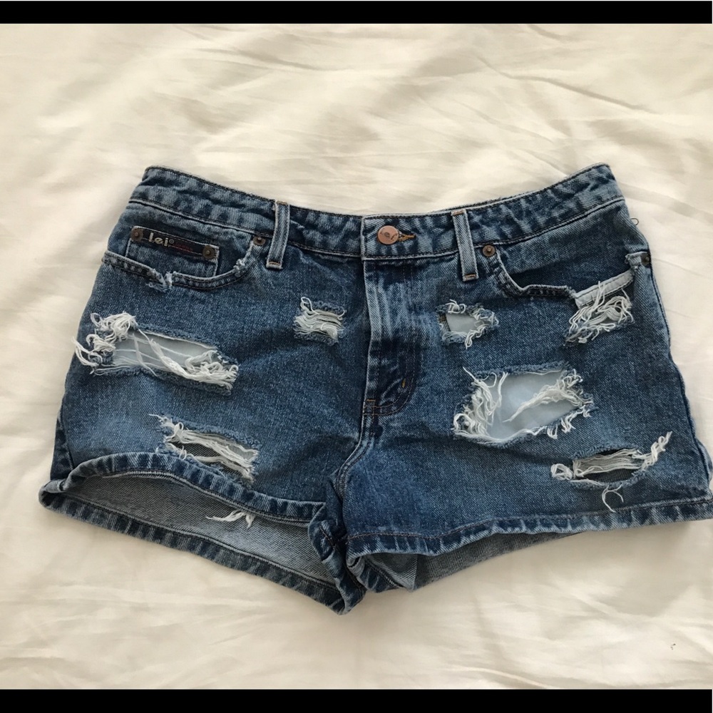 VINTAGE Distressed jean shorts
