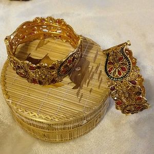 Gold and red kundan bangles