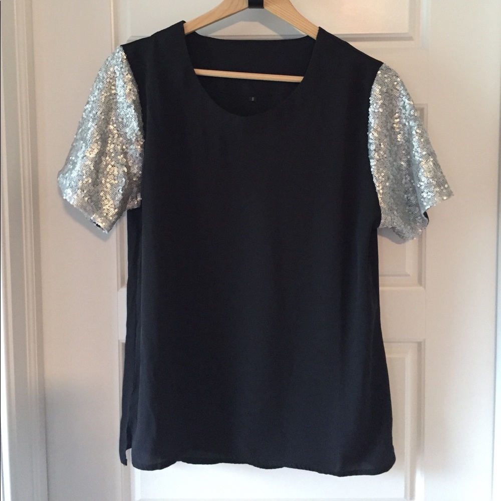 Black blouse with silver beaded sleeve