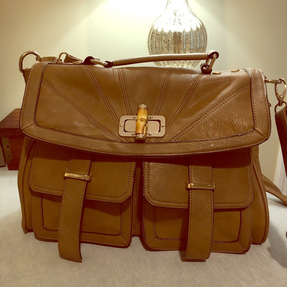 Faux brown leather satchel with cross body strap