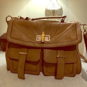 Faux brown leather satchel with cross body strap