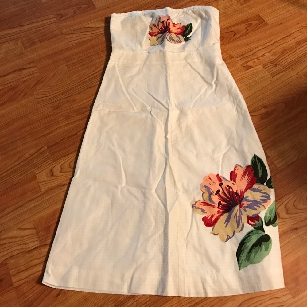 White strapless dress with bold flowers.