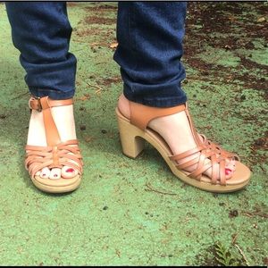 Tan clog style heel faux leather straps and buckle