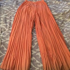 Orange wife leg pleated pants