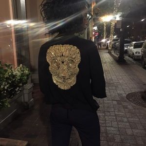 Black lightweight jacket with hand sewn gold skull