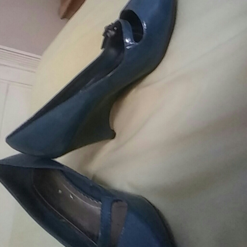 A Pair of Teal Low Wedge Heels