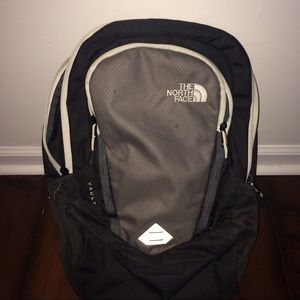 Black, White & Gray North Face Backpack