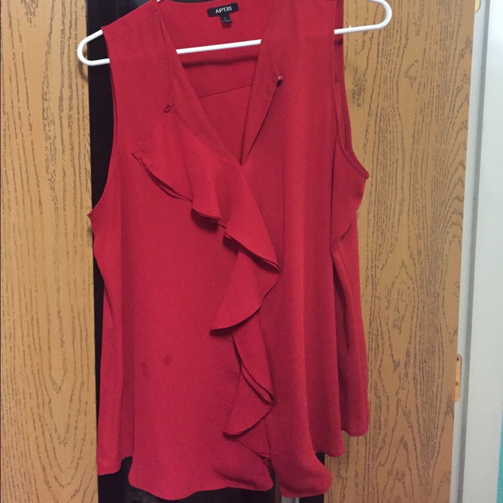 Red sleeveless blouse