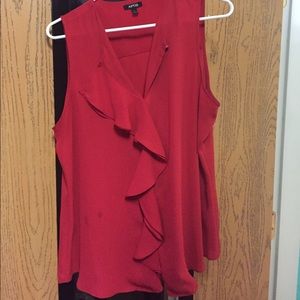 Red sleeveless blouse