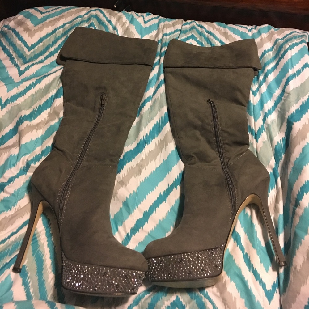 Knee high studded boots