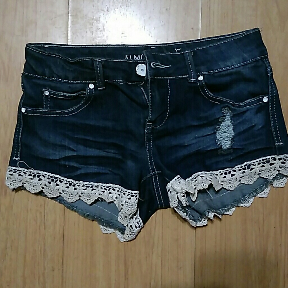 Brand new Jean shorts with lace on bottom