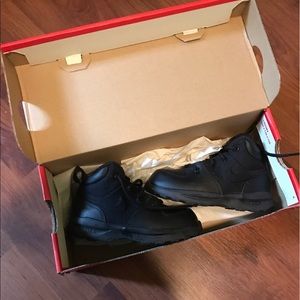 Toddler NIKE boots.