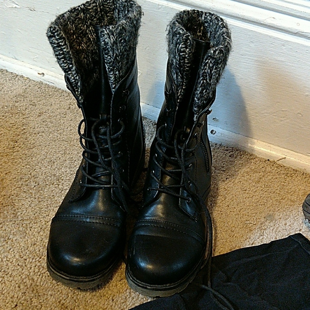 Black boots with gray trimming