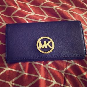Authentic Michael Kors purple wallet