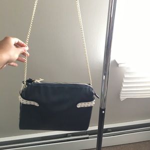 Navy and white bag with shoulder chain