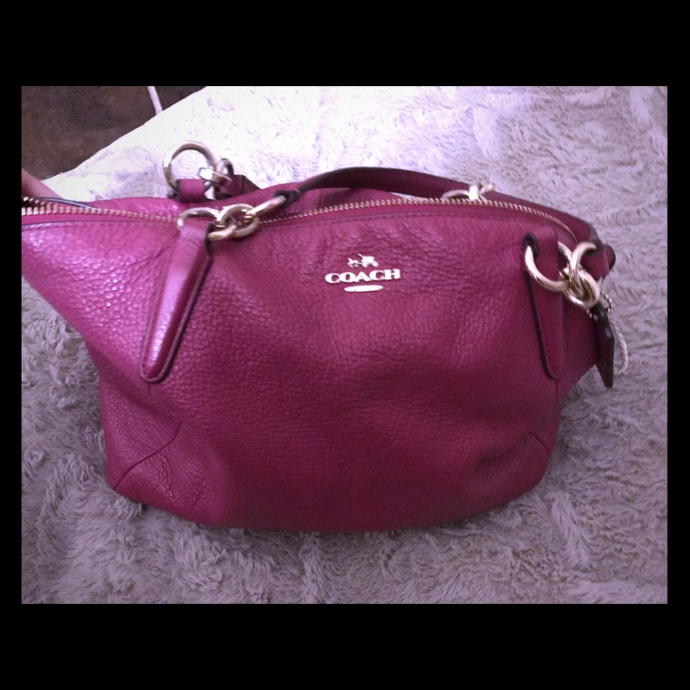 Used coach purse, hot pink. No shoulder strap.