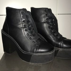 Black platform heeled lace up boots