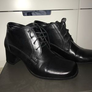 Black leather square toed lace up heels