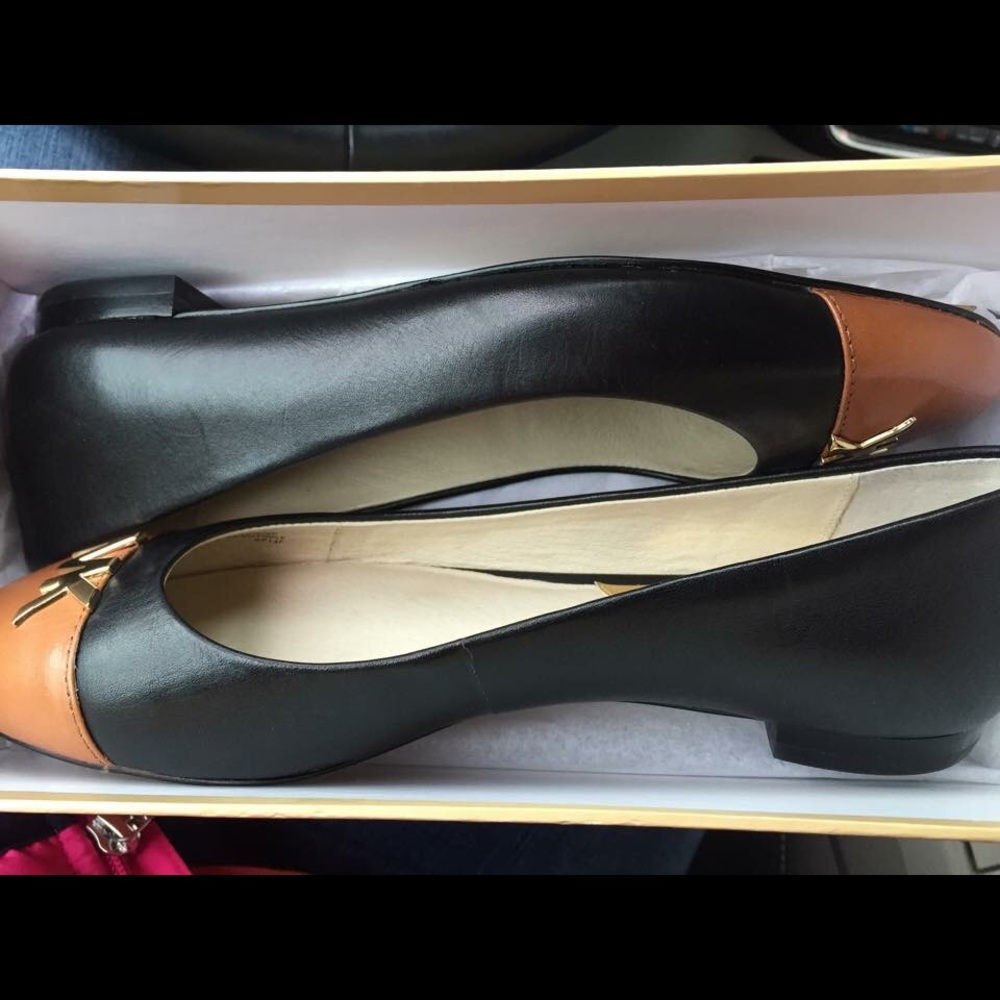 Michael Kors black and tan flats. New. (Sold out)