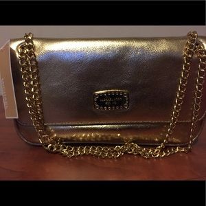 Metallic gold purse. Michael Kors. Nwt