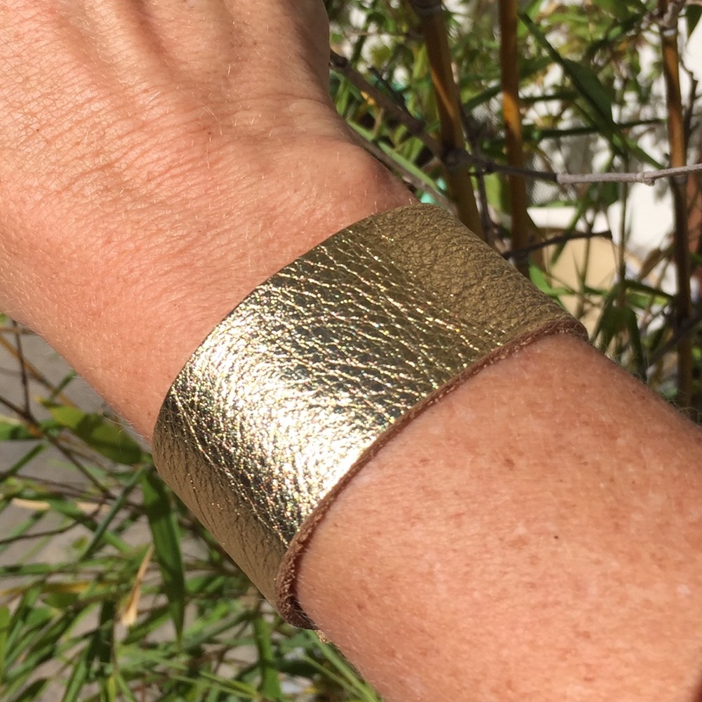 Brand new gold leather cuff