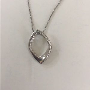 Sterling silver pendant with diamonds