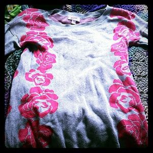 Sweater dress with hot pink rose design on sides