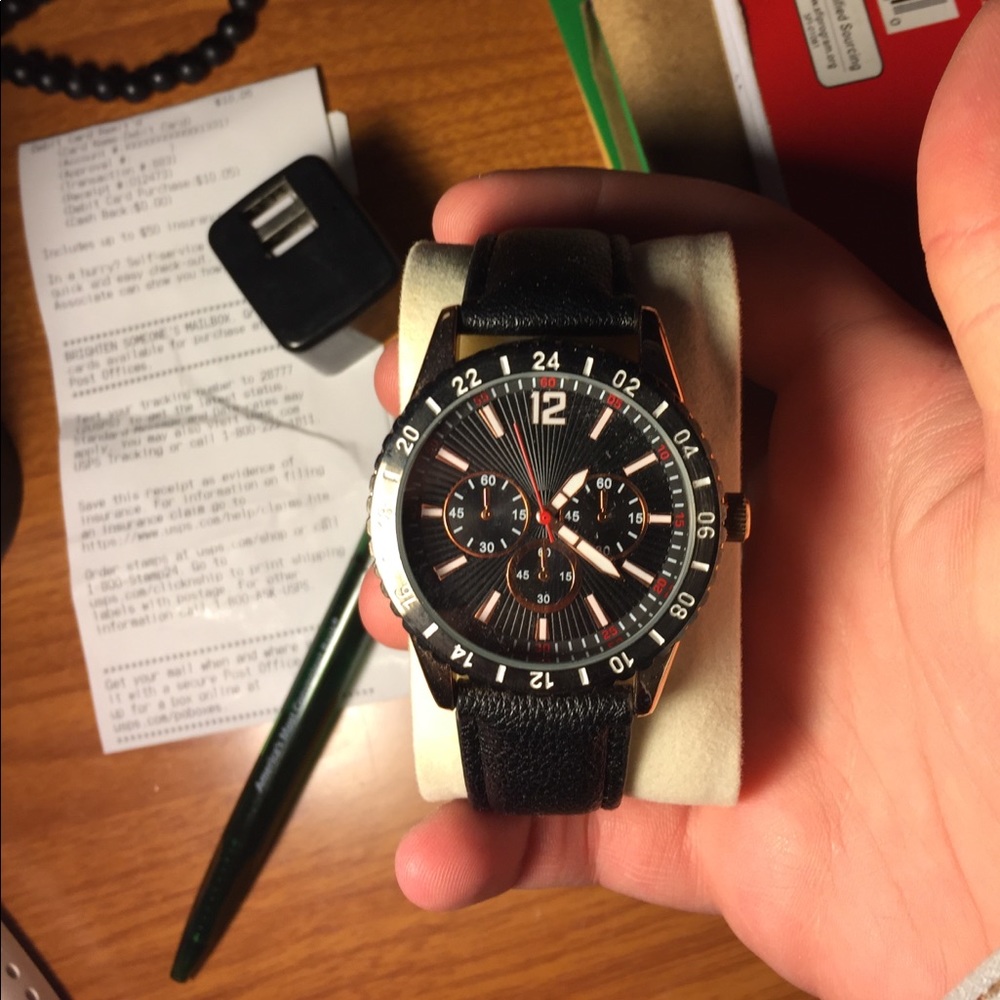 Rose gold and black watch