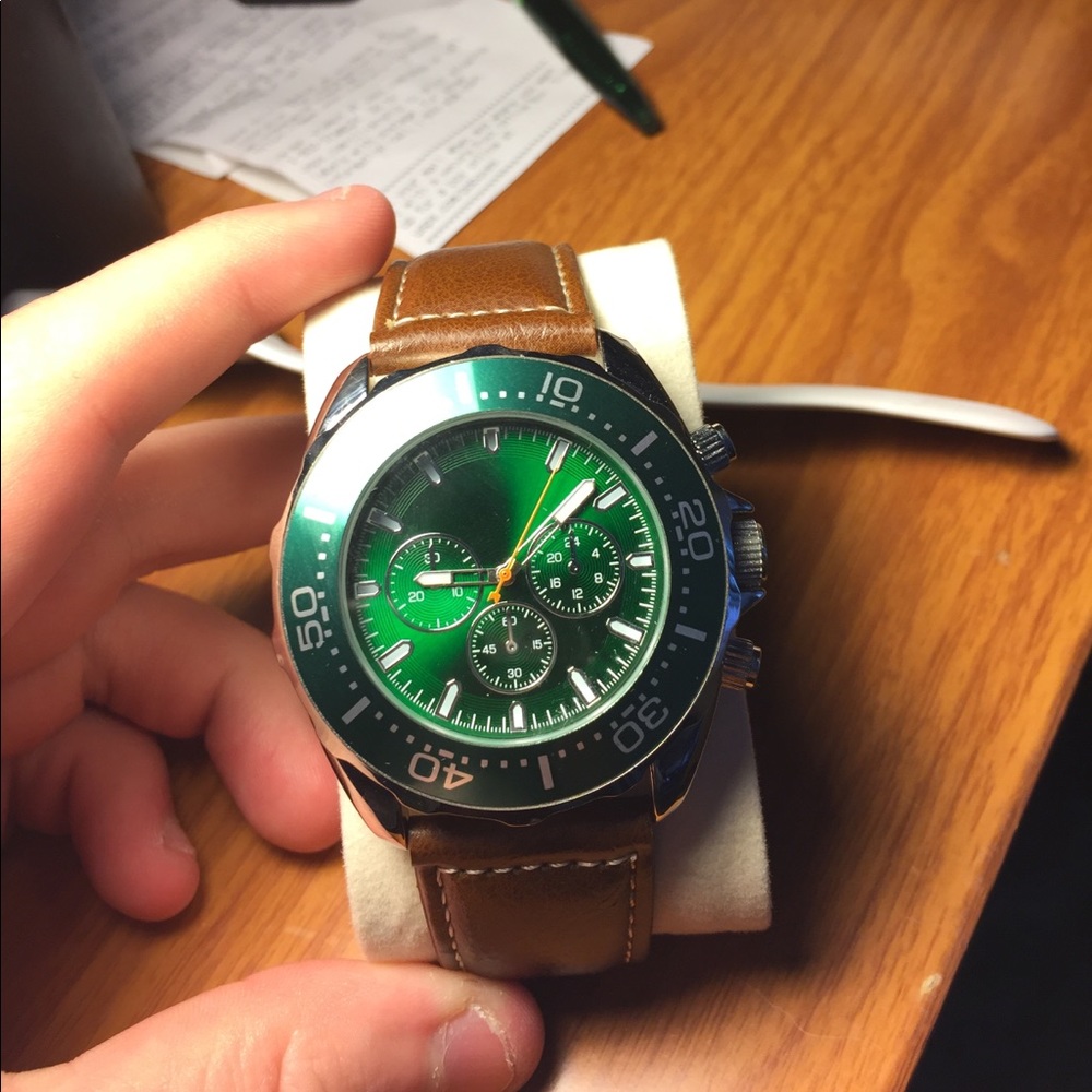 Brown leather and Green watch