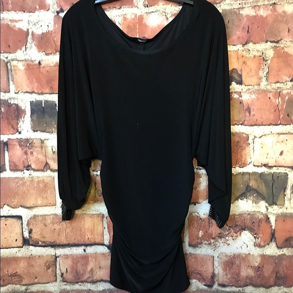 Black tunic with gold embellished cuffs