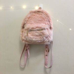 Pink fuzzy little backpack