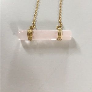 Delicate rose quartz necklace with gold chain