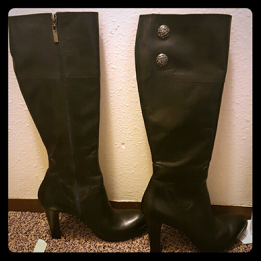 Black heeled knee high boots