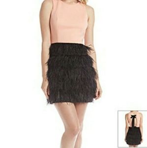 Beautiful peach/pink and black dress made by Maia.