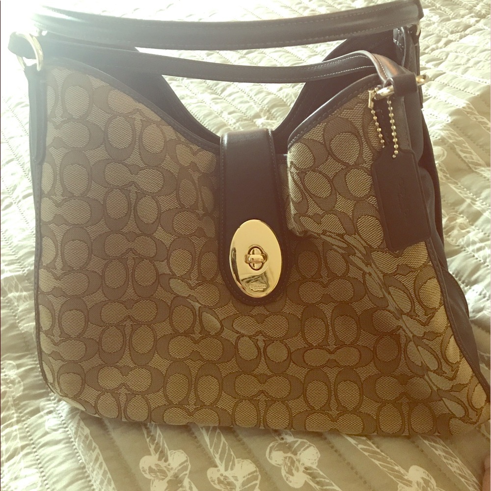 Coach fabric and leather multi pocket handbag