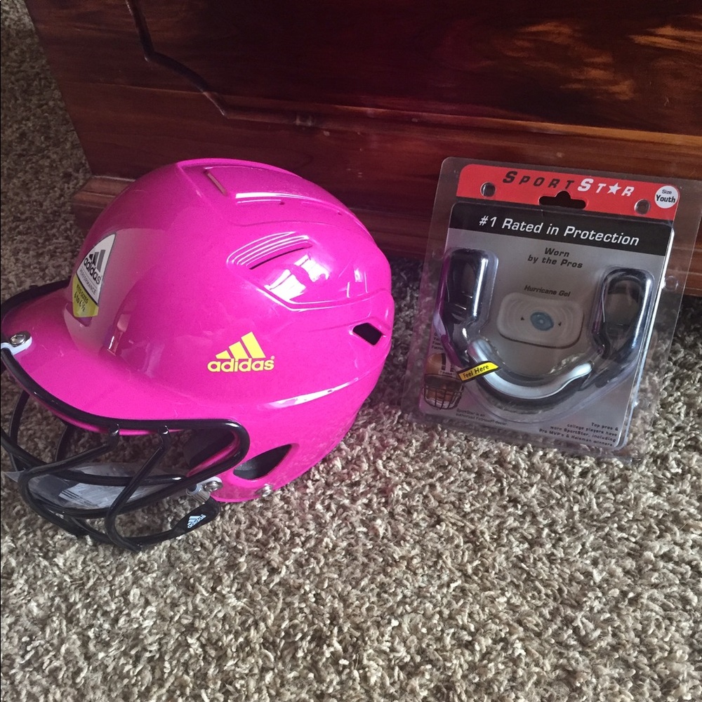 Softball helmet, face guard, and chin strap.
