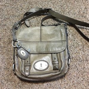 Fossil cross body leather bag.  Gray color.