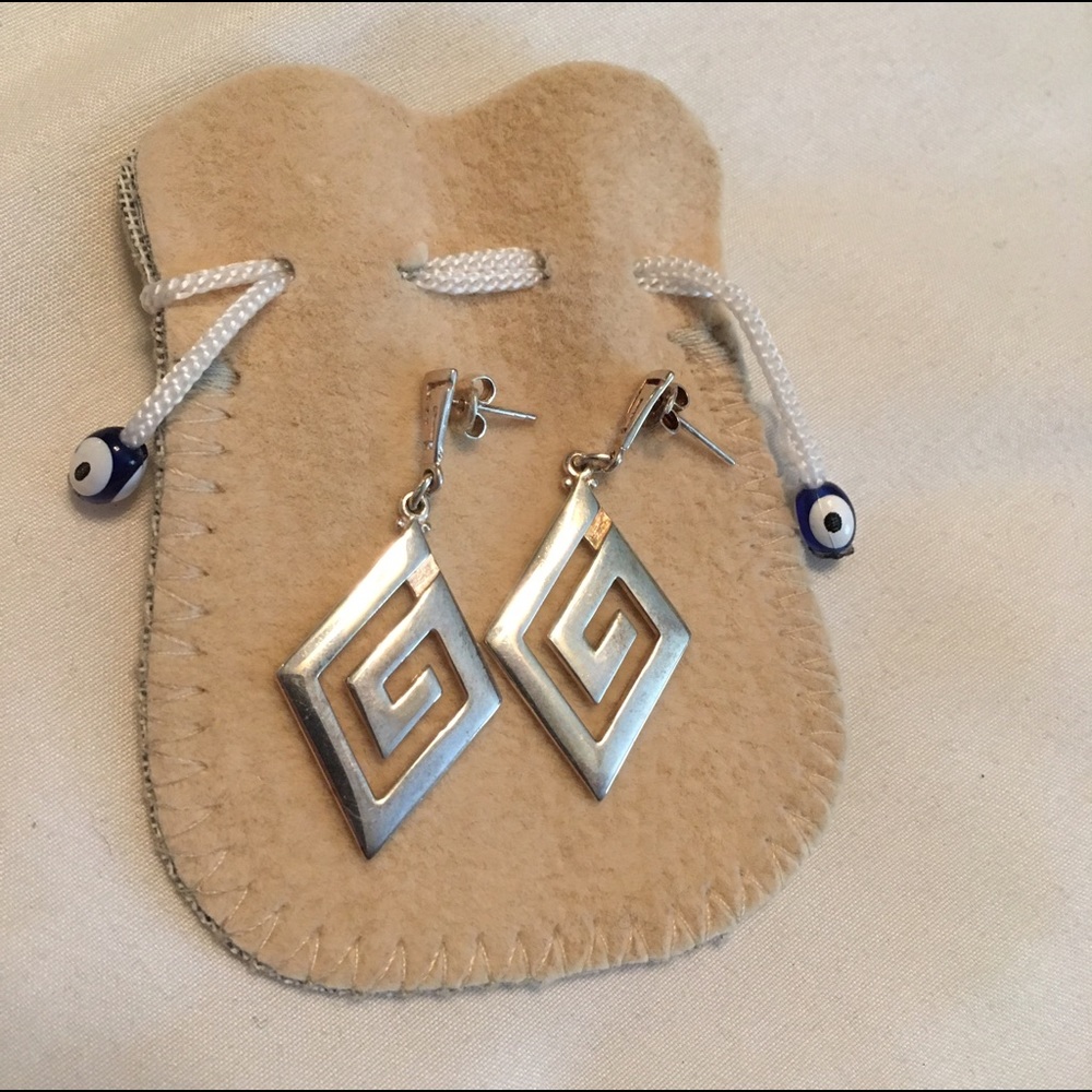 Sterling Silver geometric earrings.