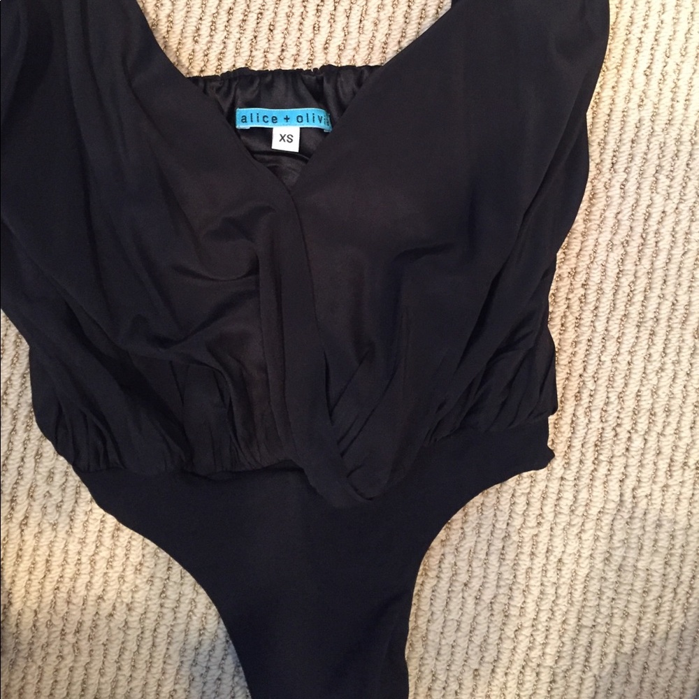 Black silk Alice + Olivia bodysuit deep V sz XS