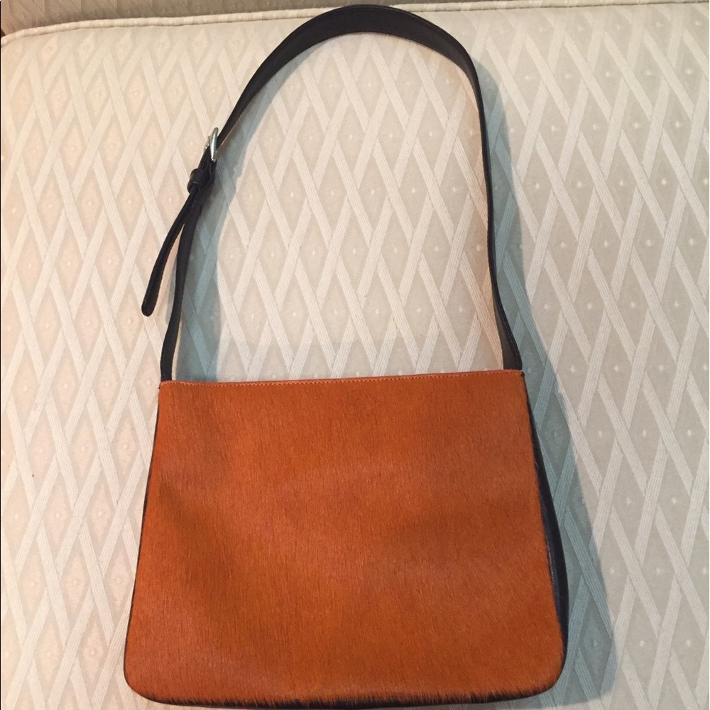 Adorable!!! Pumpkin colored pony bag🍁